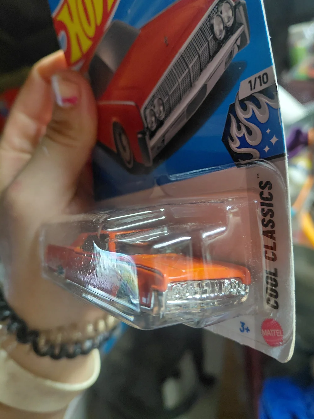 orange Hot Wheels '64 Lincoln Continental from the 2026 mainline series featurin